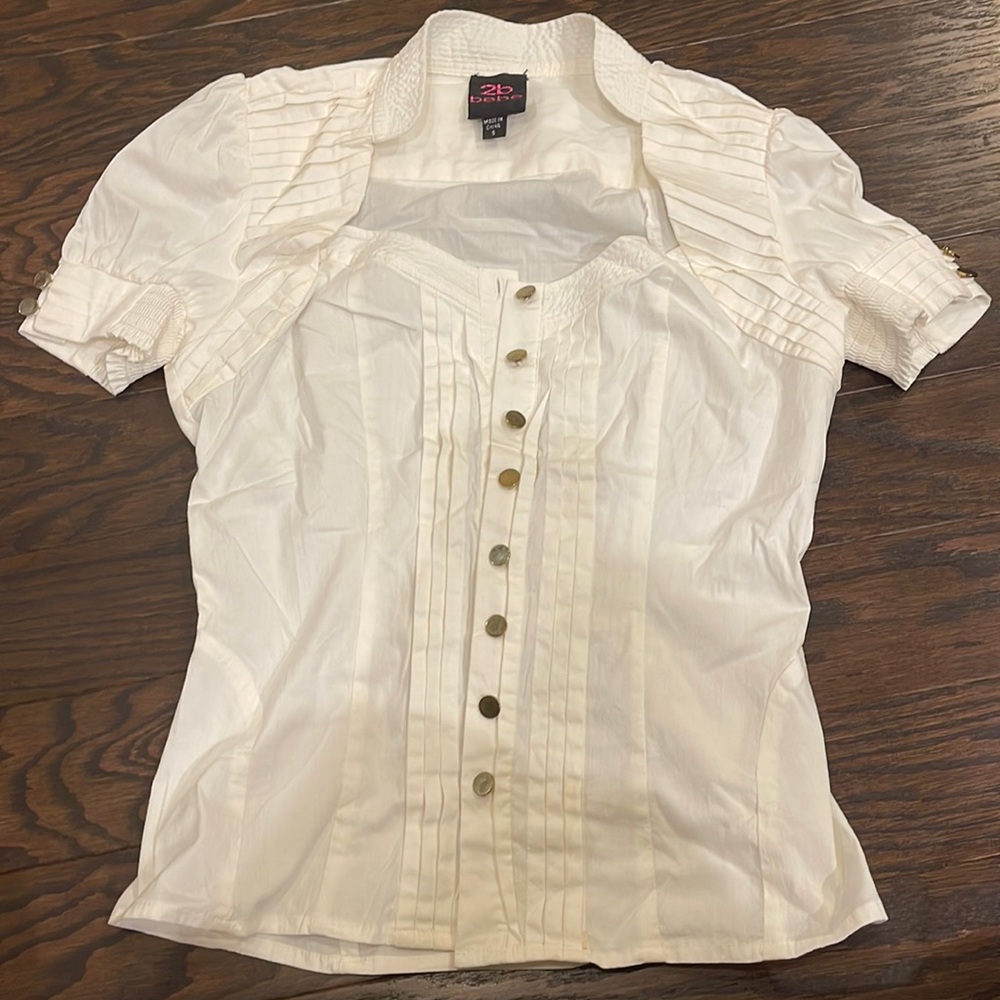Bebe cute white shirts, only worn once. Not fit me anymore.